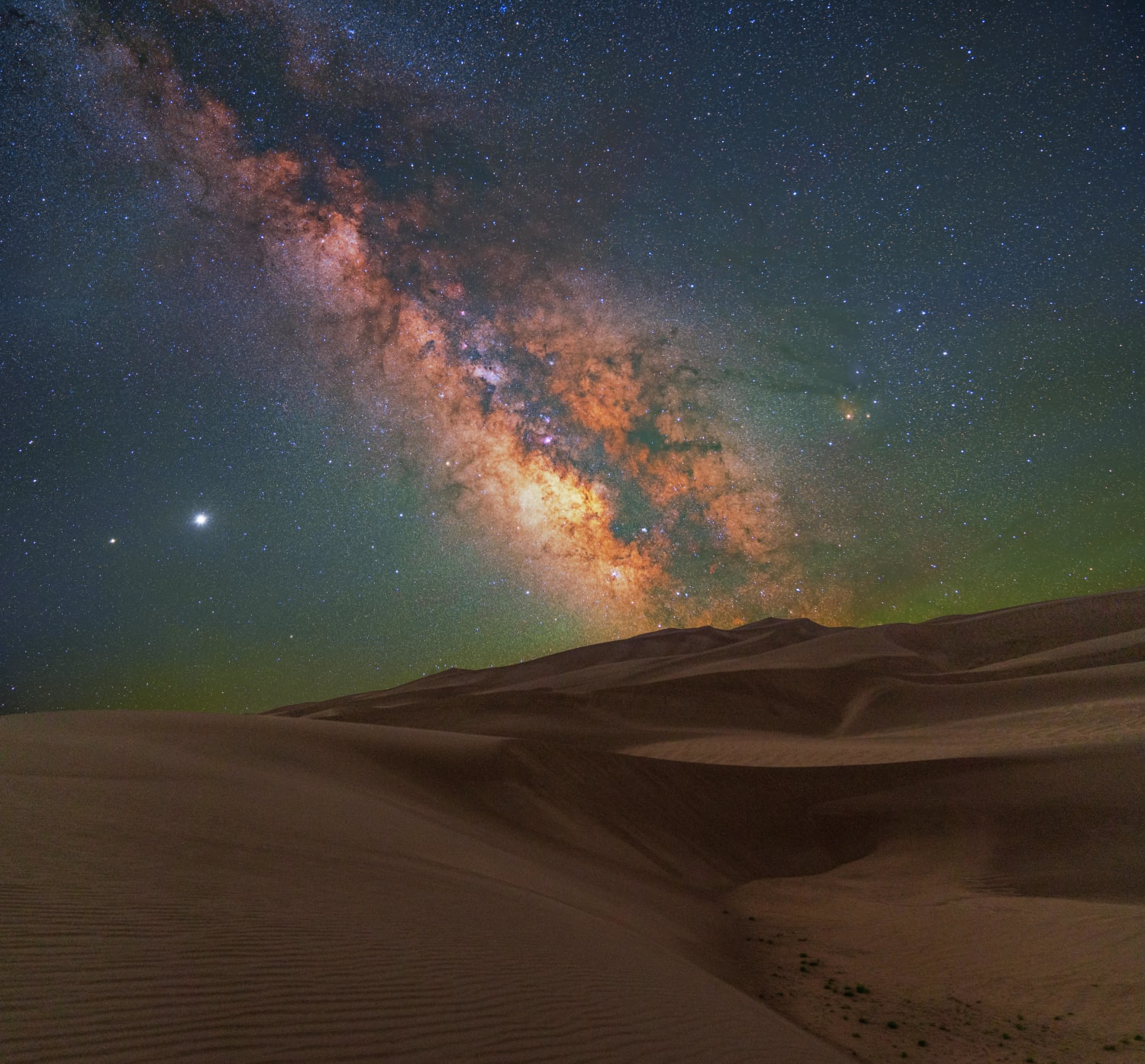 Milky Way Rising Over Waves of Sand in Great Sand Dunes National Park.
