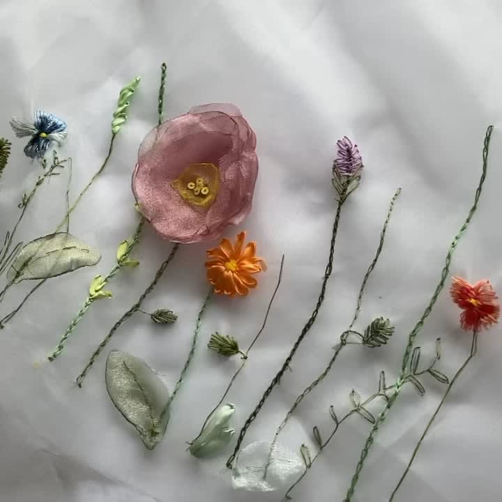 4 meters of wildflower embroidery on organza. Peonies, lavender, poppies, marigolds, pansies and daisies. It’s so long!