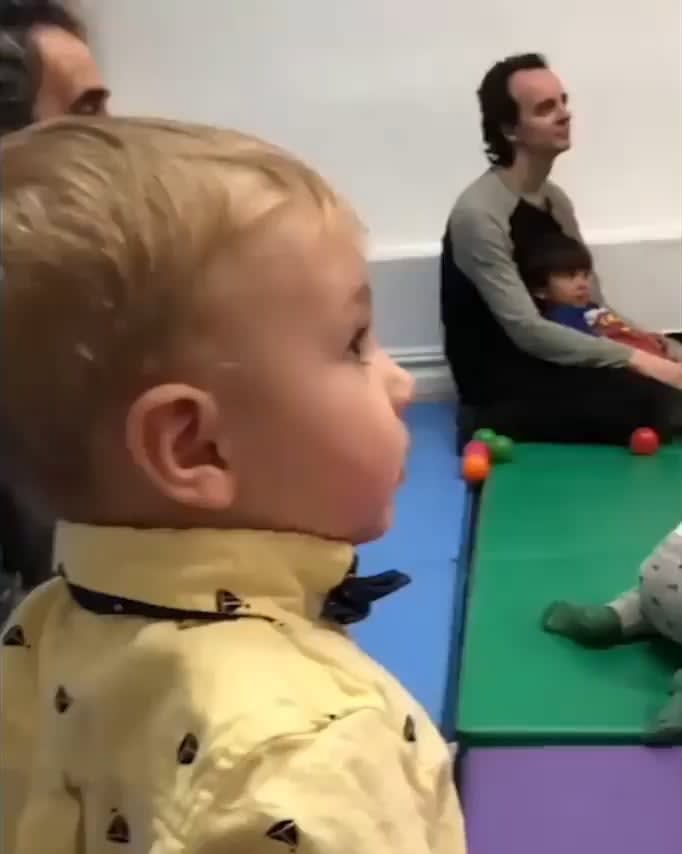 This little guy hearing a violin for the first time
