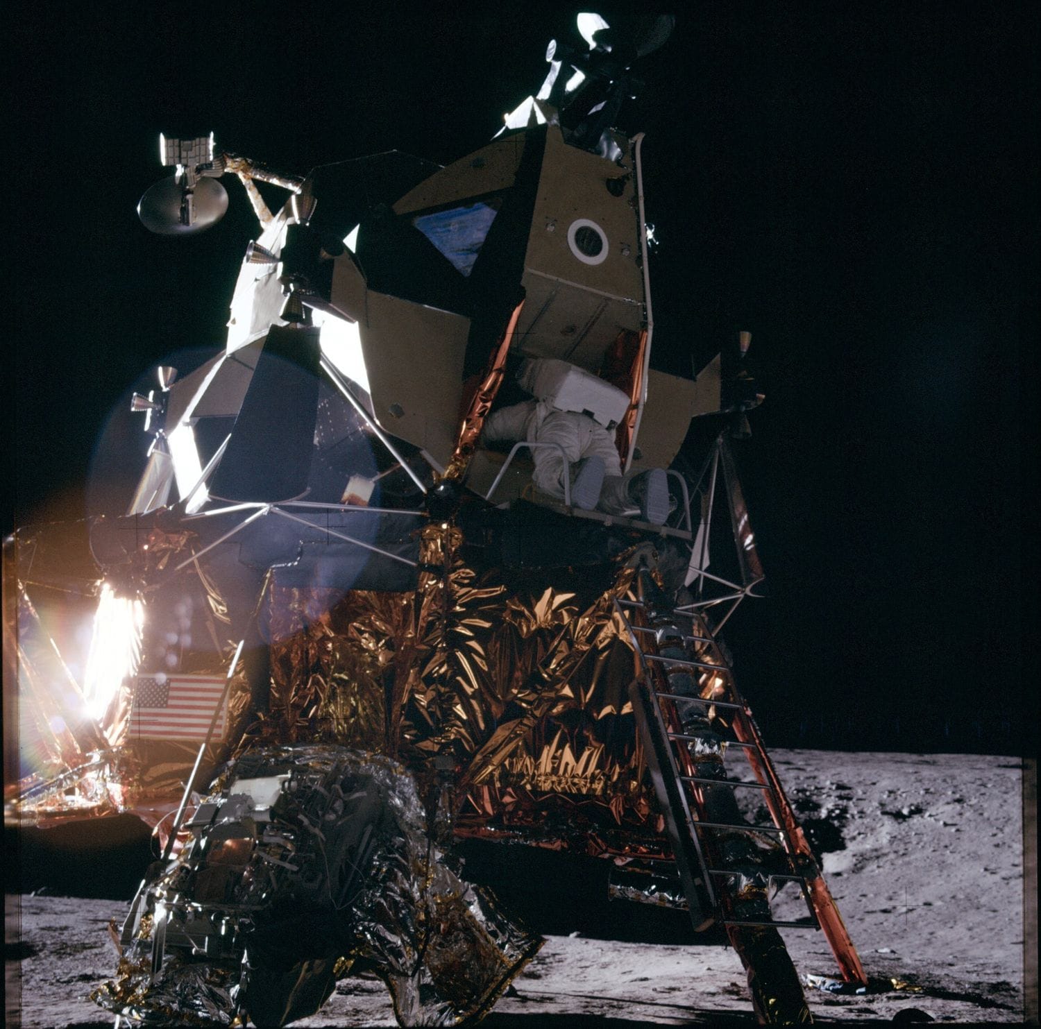 Apollo 12 Astronaut Alan L. Bean, lunar module pilot, starts down the ...