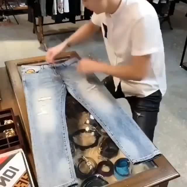 Folding a pair of jeans