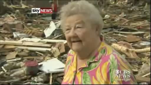 Tornado survivor finds dog buried alive under rubble in the middle of a news interview.