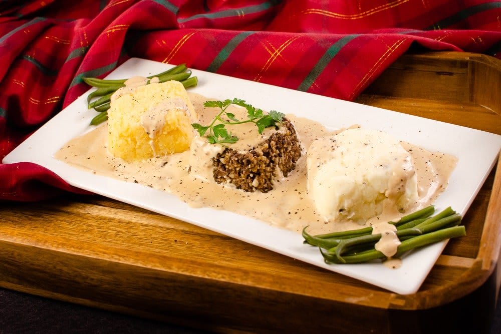 Traditional Haggis Neeps and Tatties with Creamy Whisky Sauce