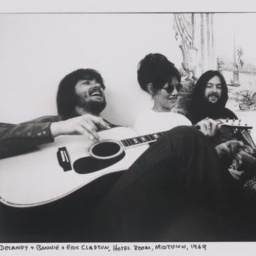 Just sitting here vibing on NationalGuitarDay with EricClapton & friends. 🎸 🌟 . . . 📸 Richard Busch. Delaney and Bonnie with Eric Clapton, Hotel Room, Midtown, 1969, Museum of the City of New York, 2017.36.15
