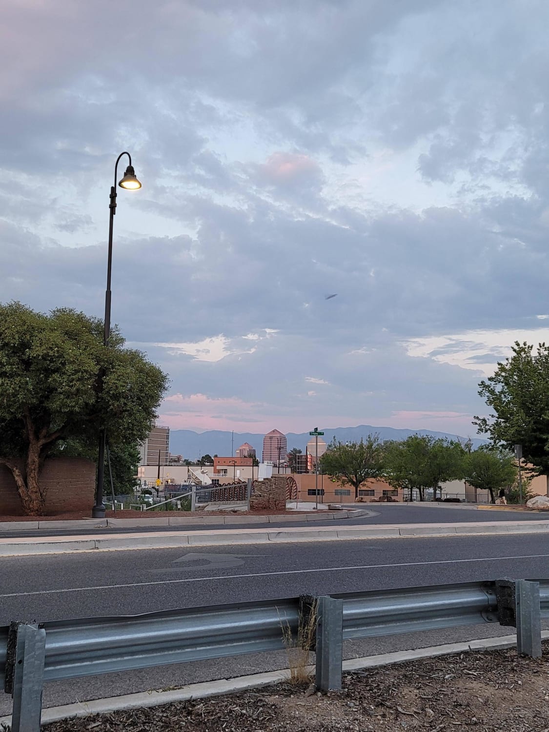 No one saw it with their eyes. My friend has a photo time stamped 7:41, this one stamped 7:42 and there is nothing in hers. We don't know what it is and it is a flying object! We live in an AFB city. (Sorry idk why its sideways)