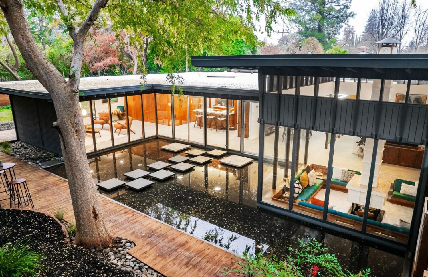 Renovated mid-century house with orginal reflecting pools, designed by John Henry Carter, 1968, Sacramento, CA