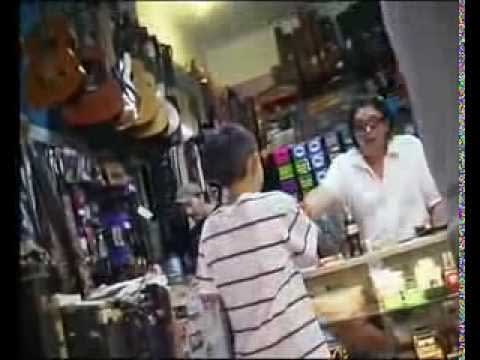 Kid Blows Away Owner of Guitar Shop - 6 yrs old, only 8000 views on Youtube. What a gem...
