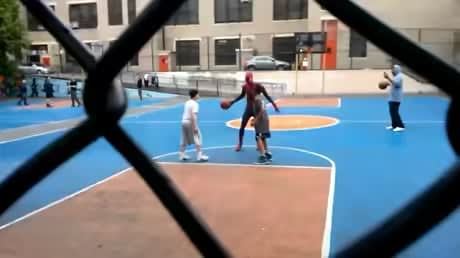 Andrew Garfield playing basketball with kids during his break while filming amazing Spider-Man 2
