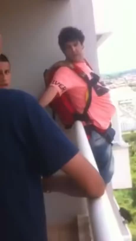 This guy literally bought a parachute on the internet and tried to jump from his own apartment. The crying woman in the end is his wife saying: "what a crazy man"