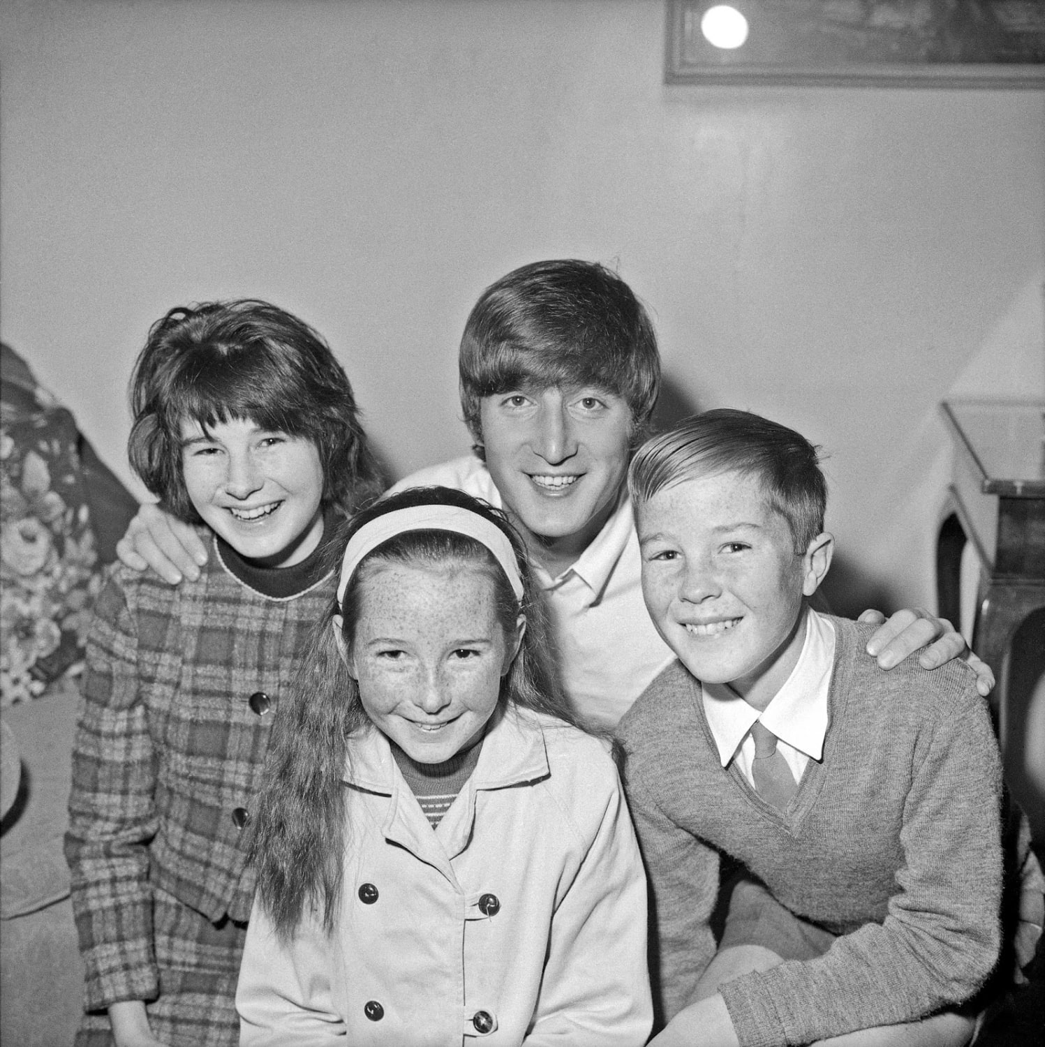 John Lennon visiting his second-cousins in Wellington, during The Beatles World Tour. New Zealand, 1964.