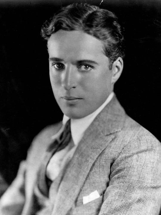 Charlie Chaplin without his makeup, looking dapper in 1920