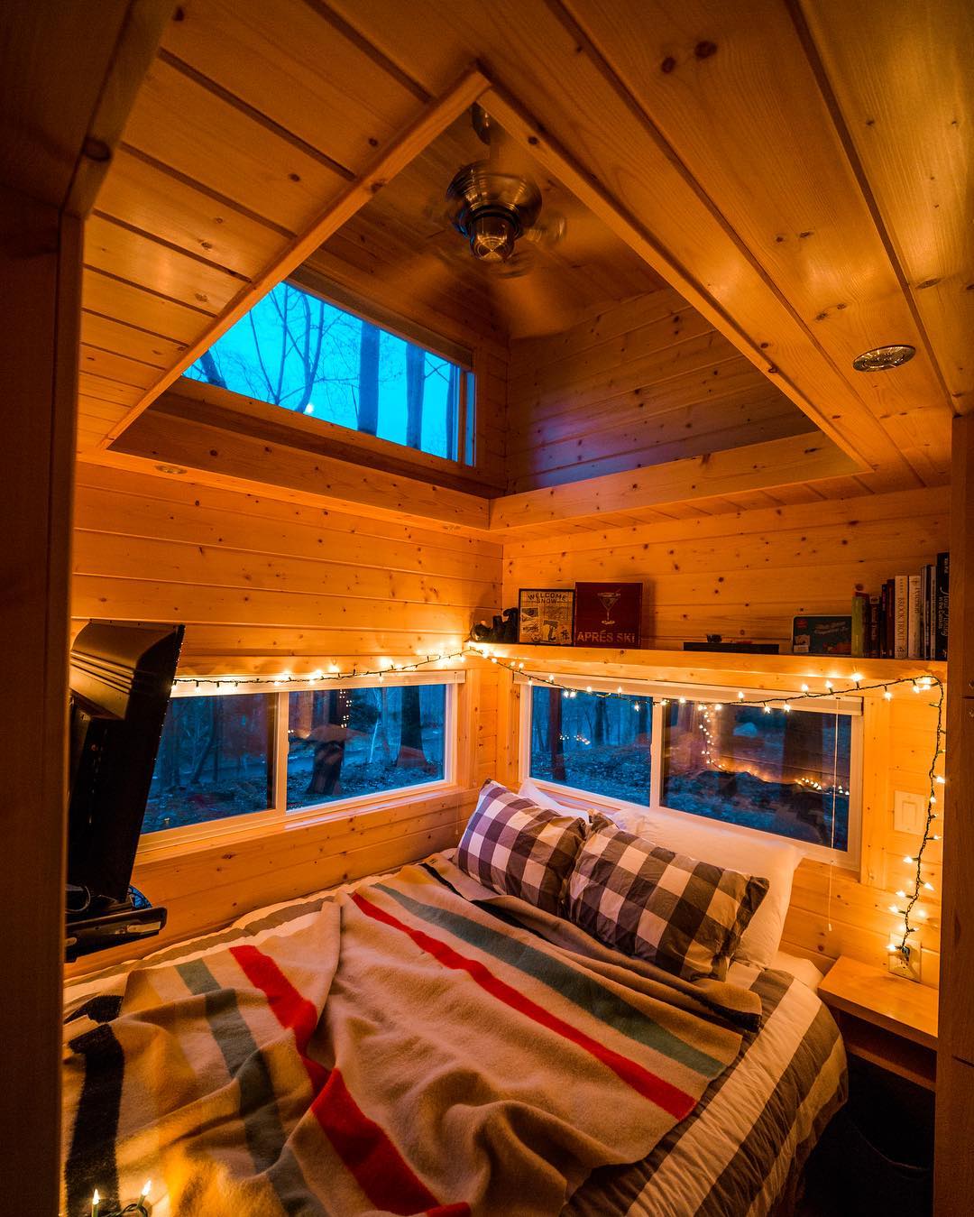 Snug cabin bedroom in the Catskills, New York.