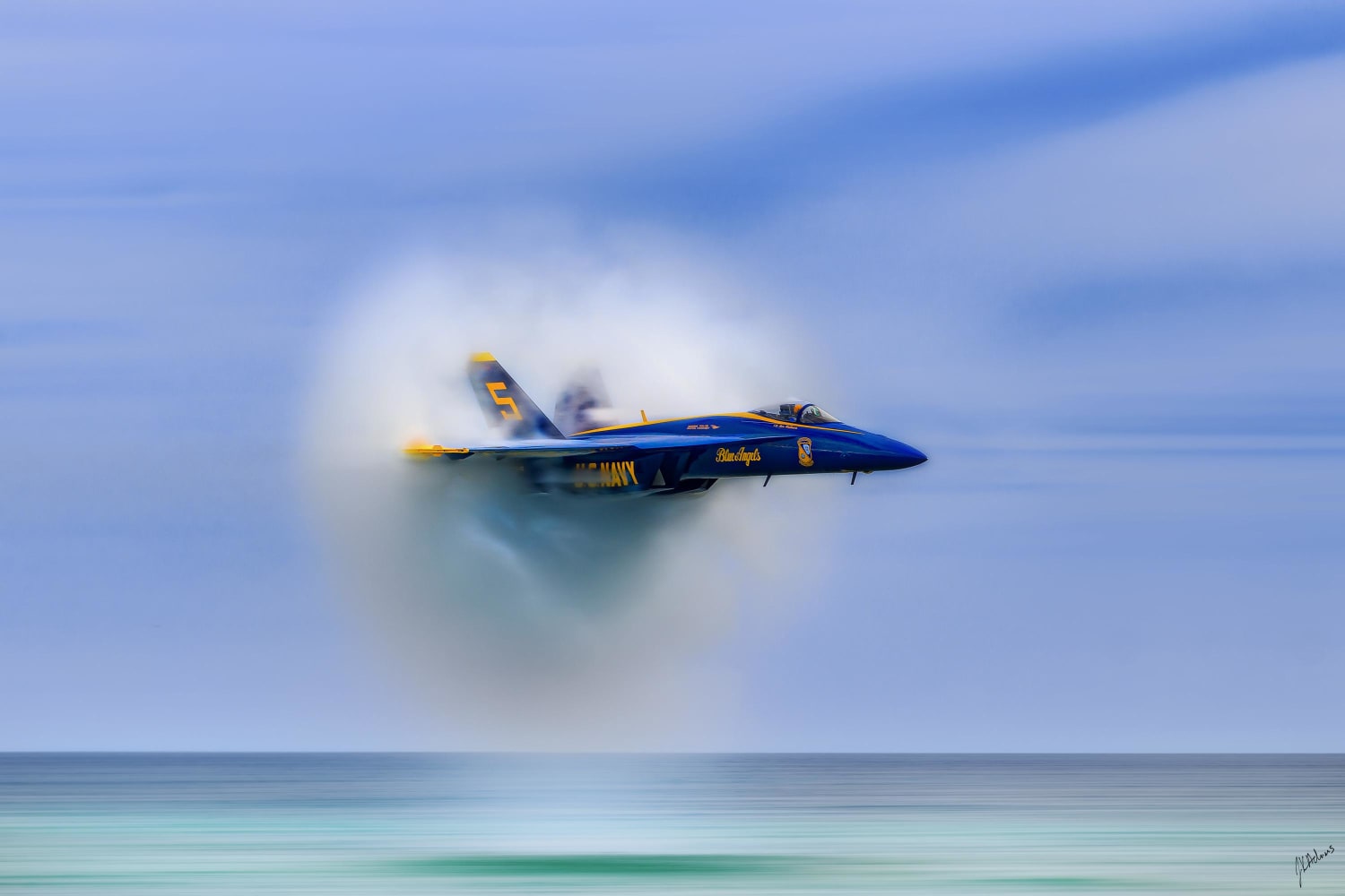This photo I took of a Blue Angels sneak pass was part of a Christmas gift to the pilot. This is the current highlight of my photography career!