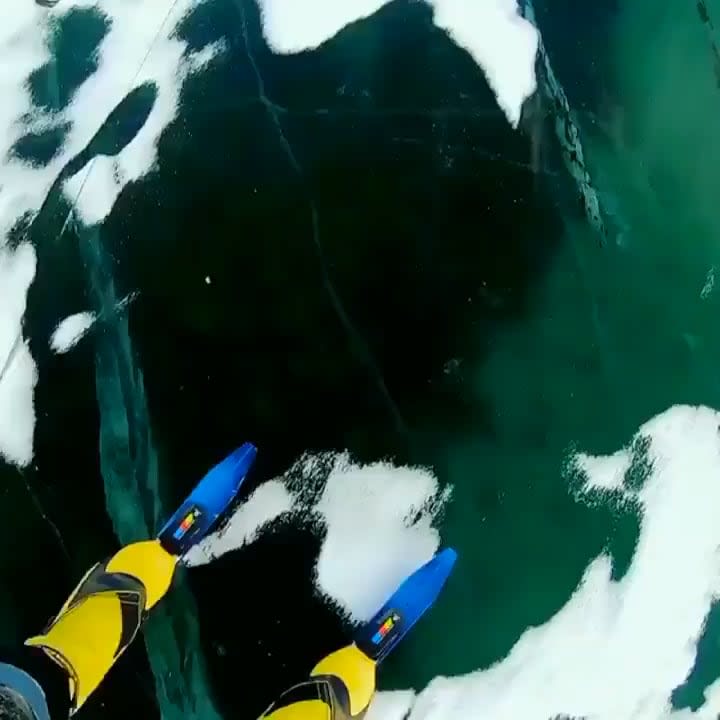Alien-like chatter of the world’s deepest lake as photographer shares eerie sounds of newly-formed ice. Alexey Kolganov films himself skating on transparent ice of lake Baikal, as new cracks form under his skates