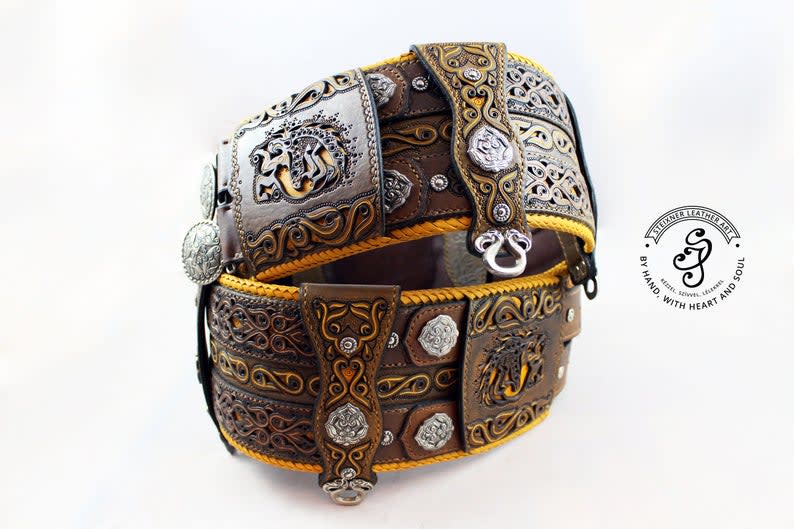 I created this leather belt inspired by LOTR and some mythological and legendary creatures. It took me 4 month to create it bc I richly decorated it.
