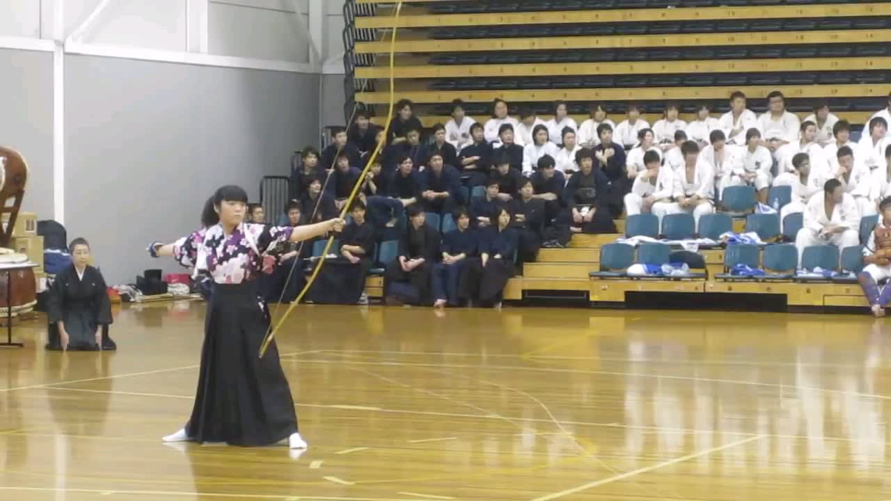 The sound of an arrow being released from bow during a Kyudo (Japanese archery) demonstration. Nippon Sports Science University perform at Albert Park Sports Stadium, Melbourne on 13 February 2010.