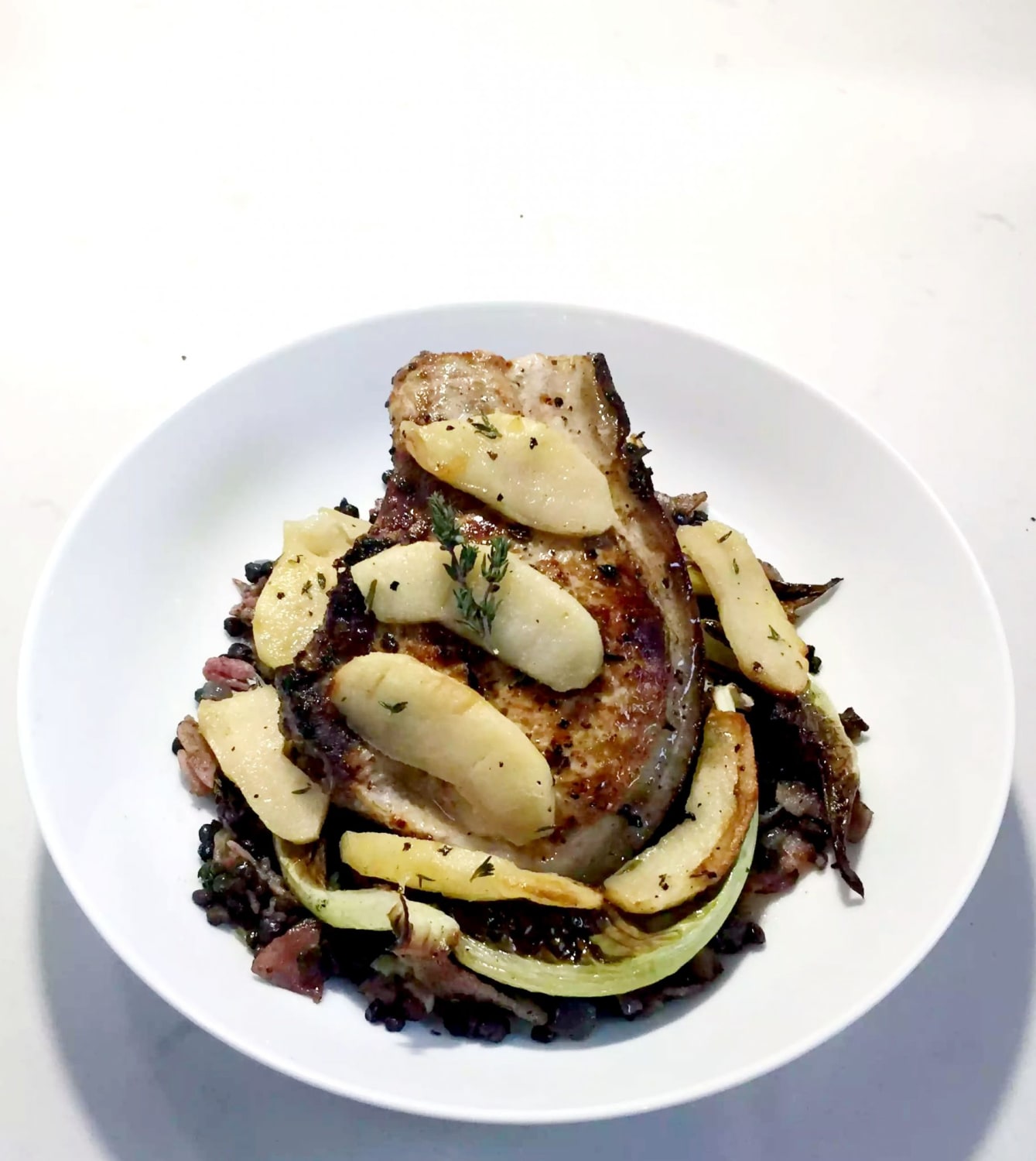 Pork Chops with Butter Poached Apples - Emma Eats & Explores
