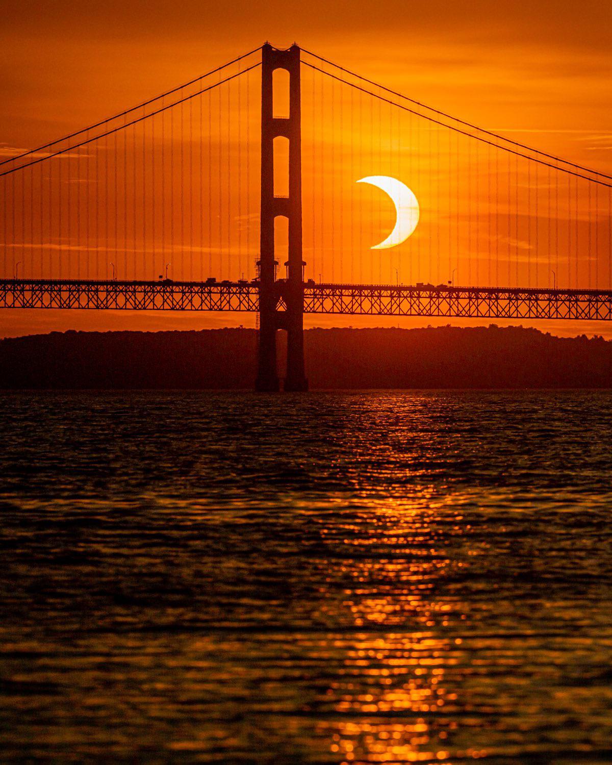 Crescent sunrise: I lined up Thursday’s solar eclipse with the Mackinac Bridge in northern Michigan.