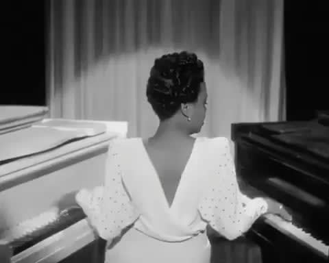 Hazel Scott playing two pianos in 1943