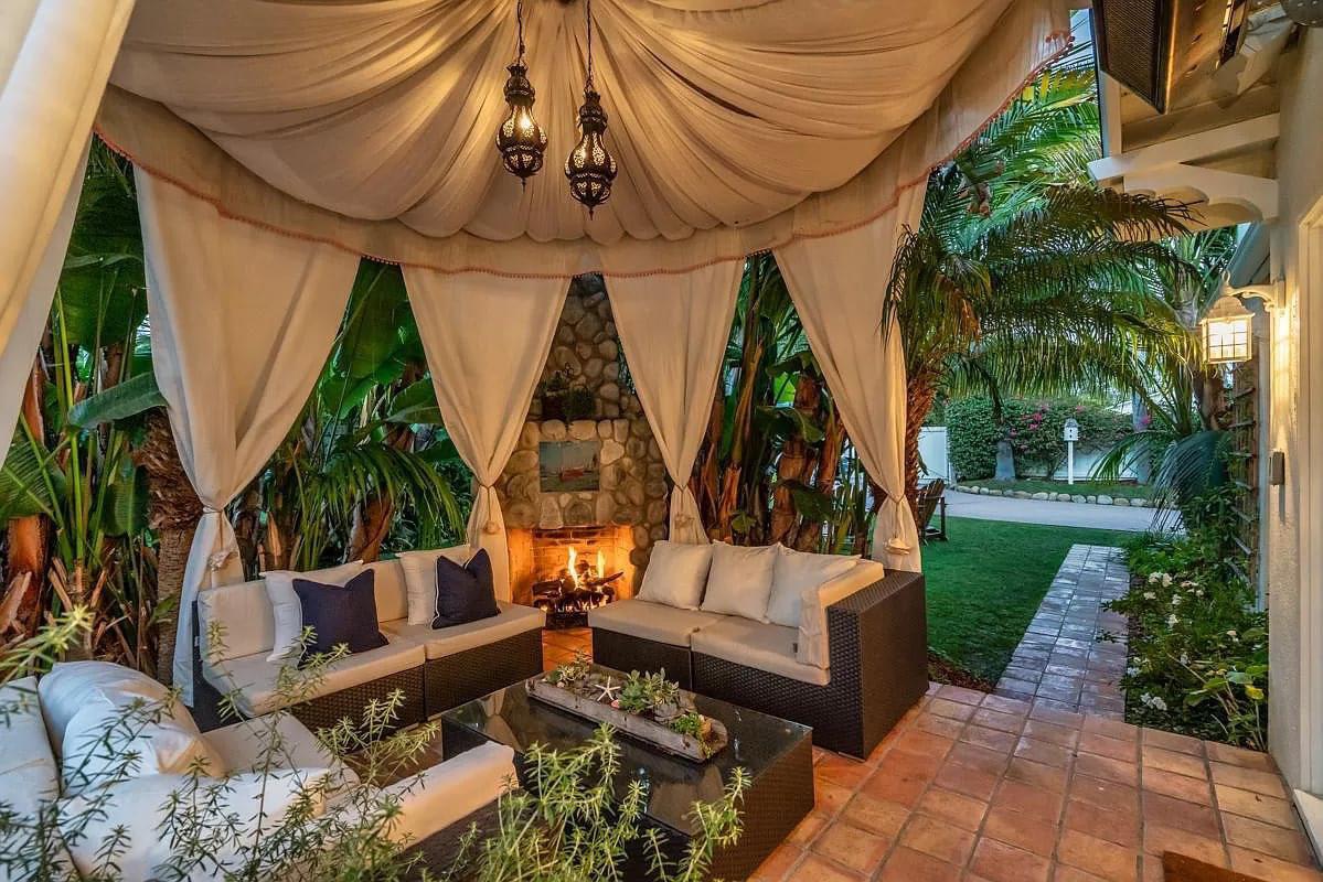 This cozy backyard oasis in Santa Barbara. Not mine but a girl can dream.