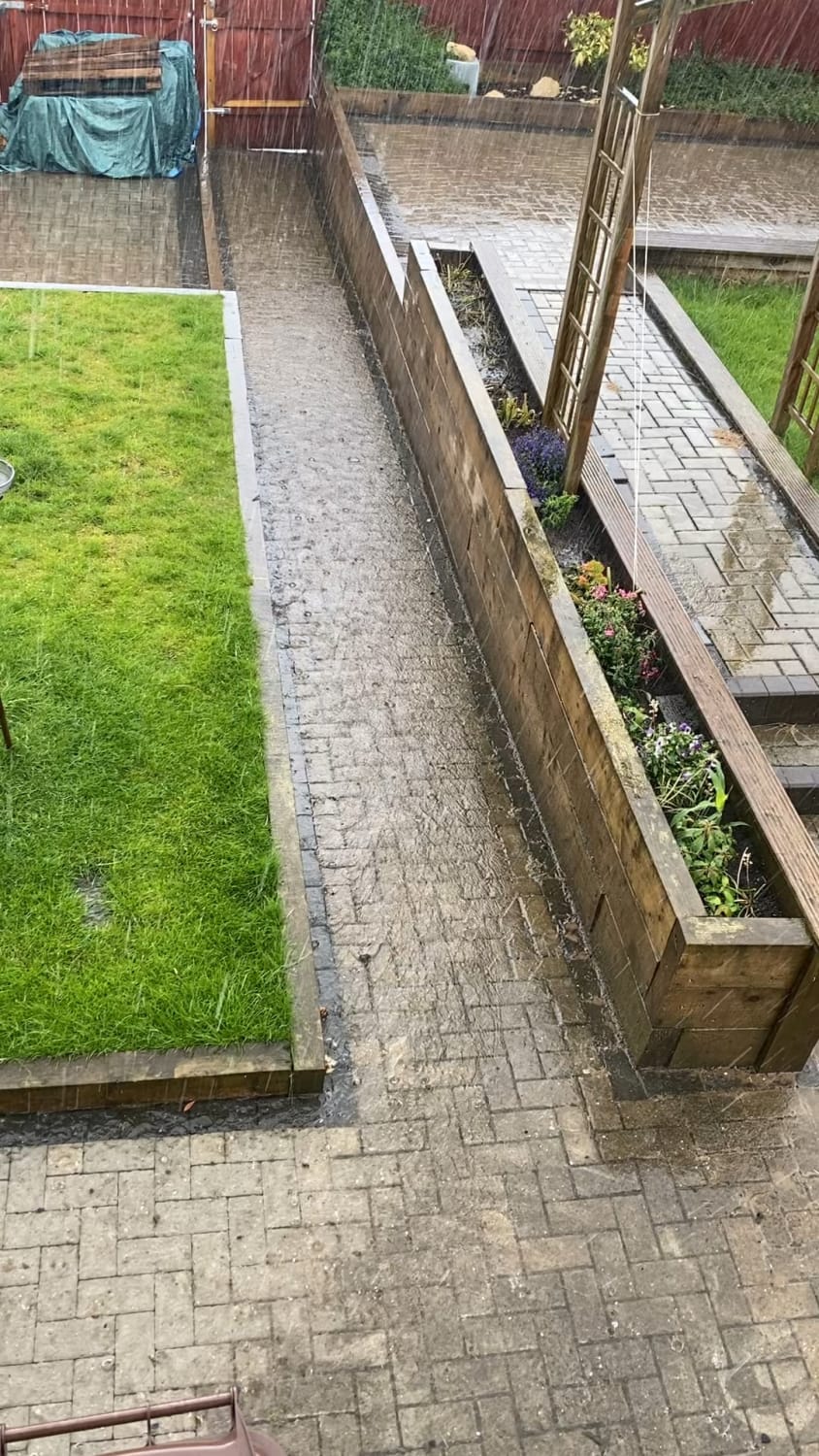 The path in my garden was designed to channel rain water to let it run away