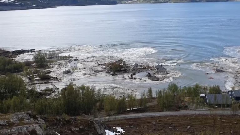 Norway landslide sweeps dog and eight houses into sea