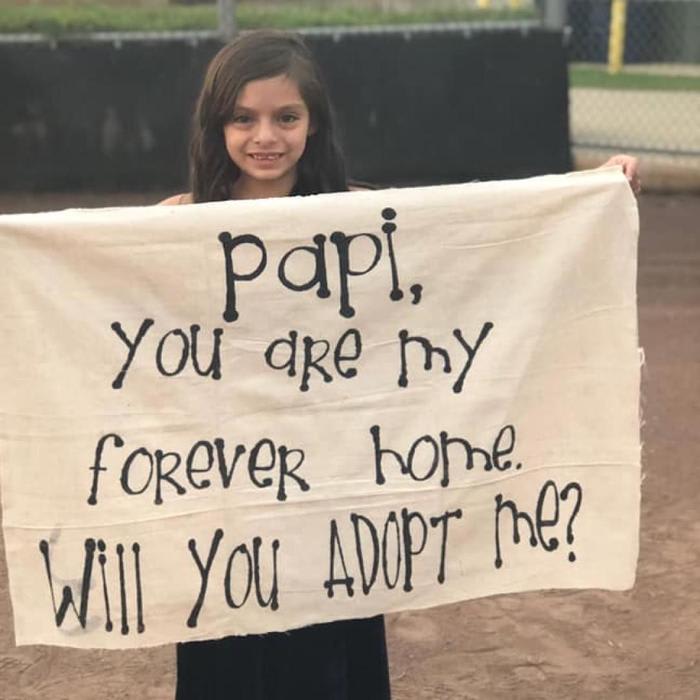 This little girl surprised her stepdad on a baseball field with a big question