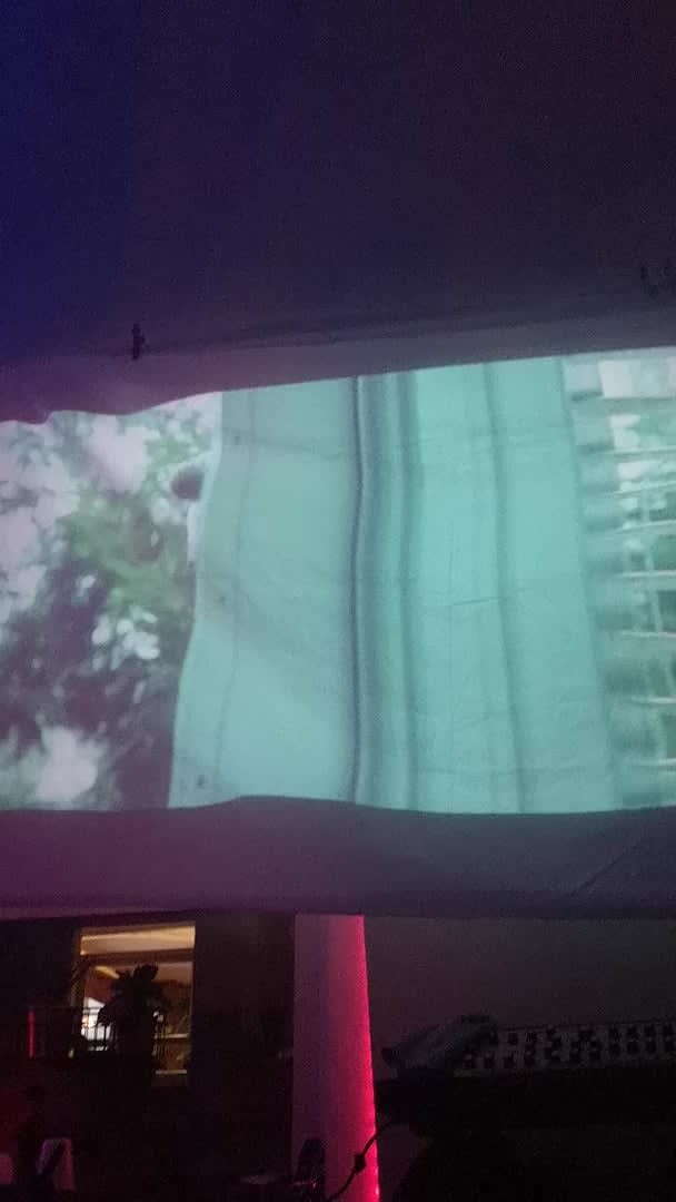 Twilight on a poorly hung projector screen