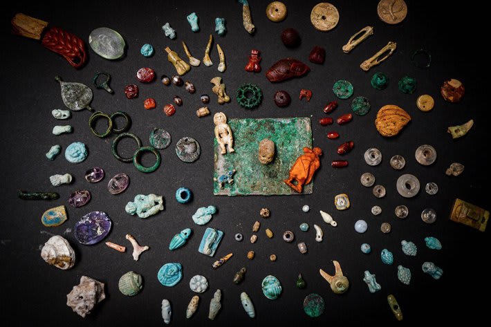 A 2,000-year-old collection of possible ritual objects thought to have served as women’s “good luck charms” has been discovered under a layer of volcanic material in the high-status Pompeii dwelling known as the House of the Garden.