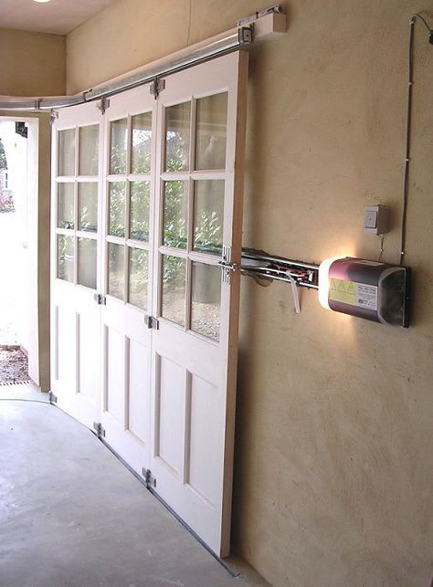 I love these sliding garage doors! To prevent blocking any ceiling room or light. | Garage doors, Garage decor, Sliding garage doors