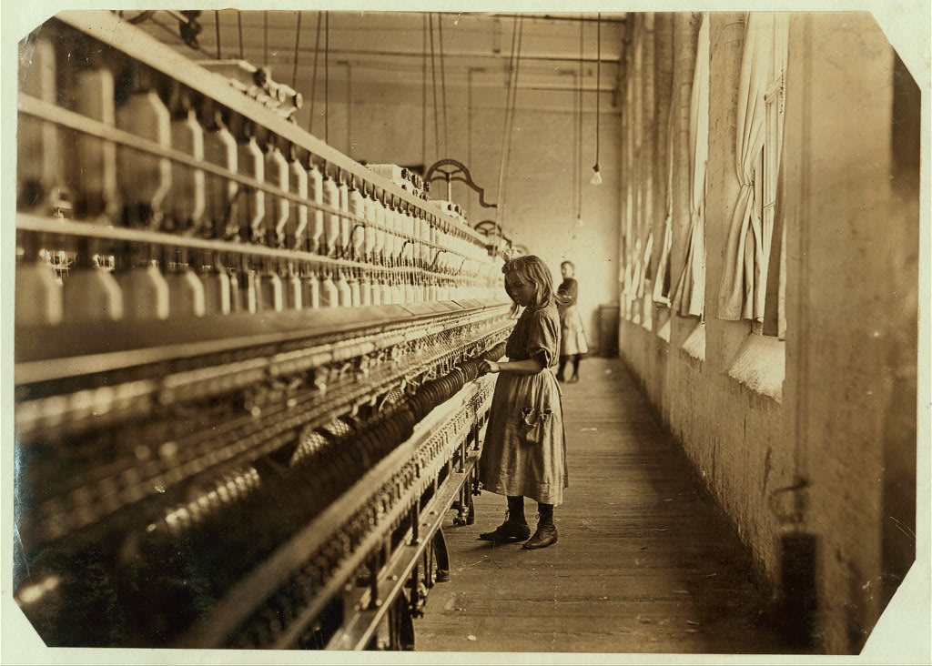 Sadie Pfeifer, 48 inches high, has worked half a year. One of the many small children at work in Lancaster Cotton Mills. Nov. 30, 1908. Location: Lancaster, South Carolina. / L.W. [Hine]