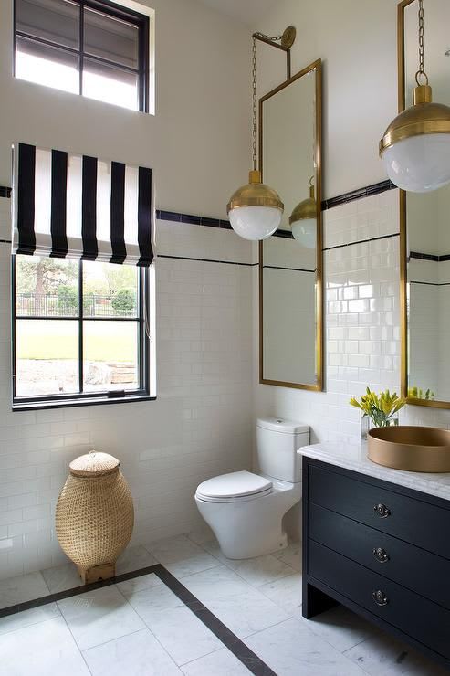 Stylish black and white bathroom boasting gold accents features Hicks Pendants hung in front of Restoration … | Elegant bathroom, Bathroom design, Bathroom interior