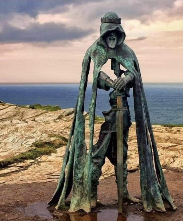 A statue of King Arthur outside a castle in Cornwall