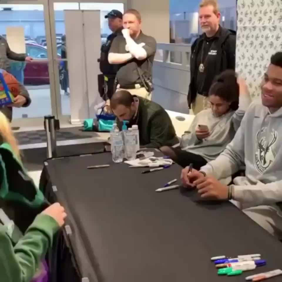 NBA player Giannis Antetokounmpo's wholesome reaction to a young fan showing him some of her artwork.