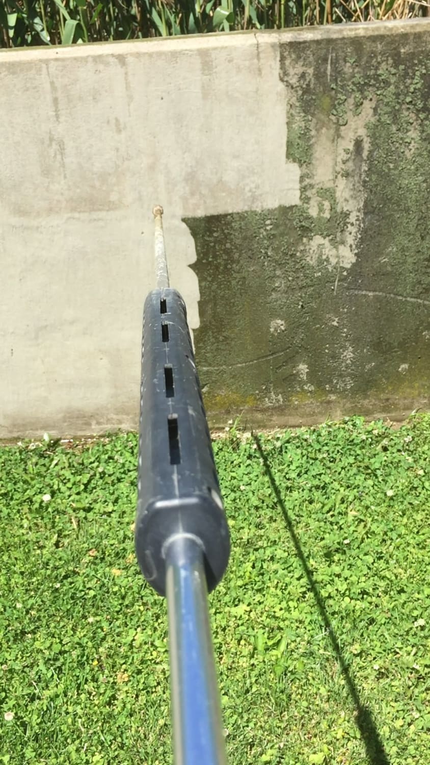 Pressure washing the walls of a wastewater treatment plant’s reed beds