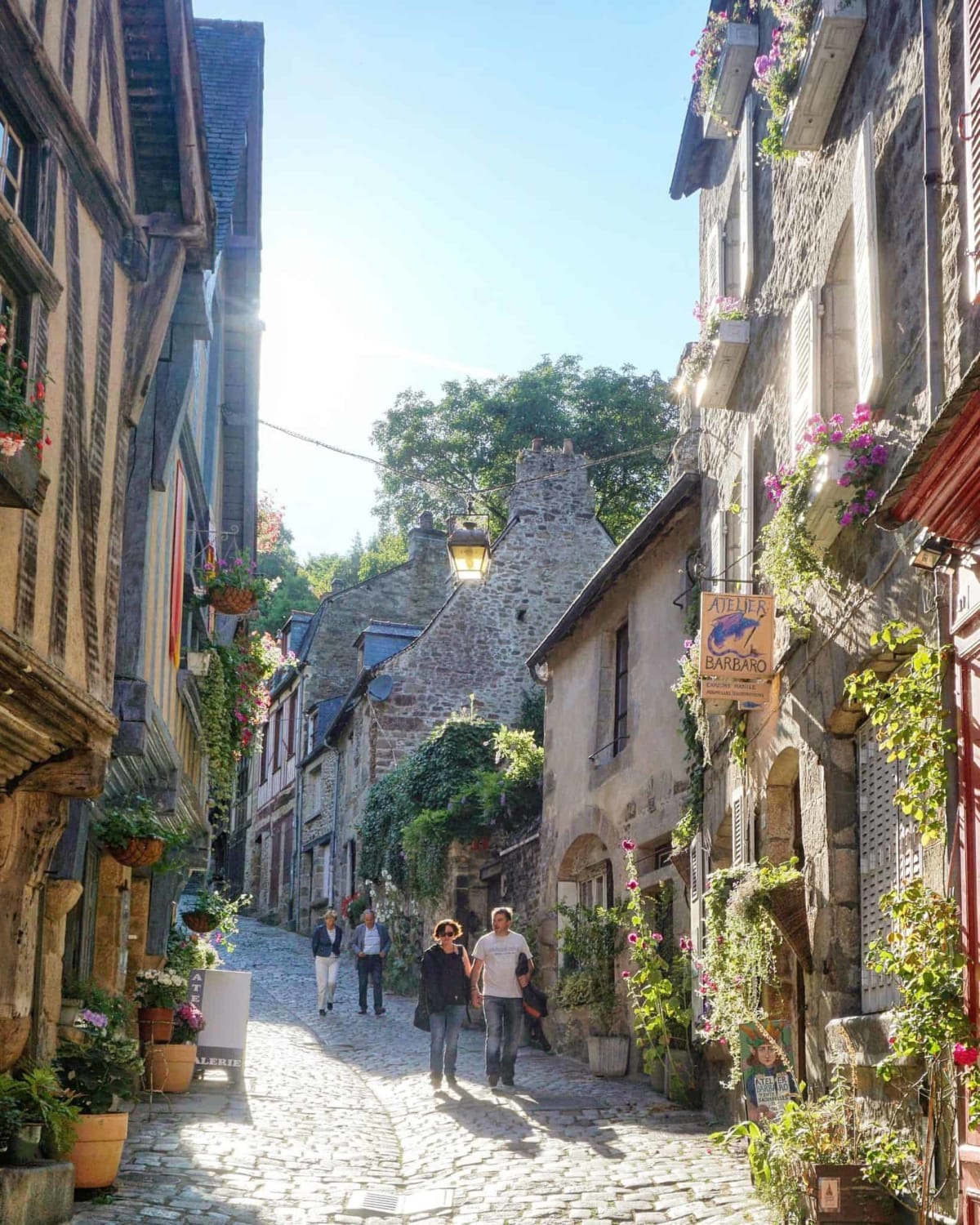 Dinan, a charming town in France, known for its medieval ramparts, cobblestone streets and half-timbered houses.