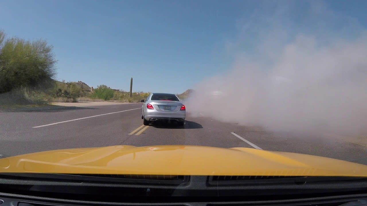Instant Karma Road Rage in Scottsdale AZ - Jeep goes off-road and catches some air while driving like an idiot.