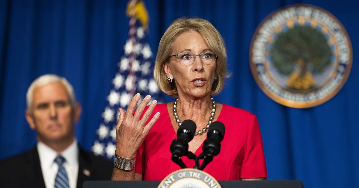 DeVos defends push to reopen schools as Trump administration is accused of 'messing with' children's health