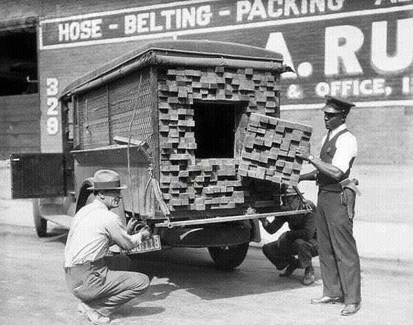 Alcohol smuggling lumber truck during prohibition in 1926
