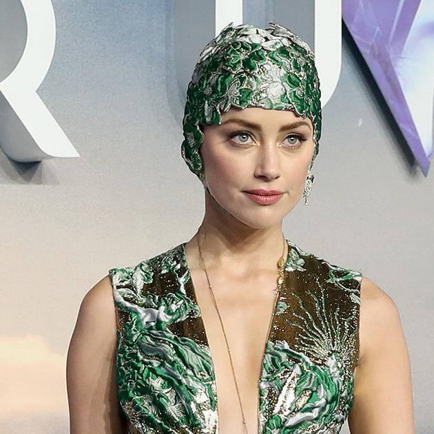 Amber Heard Wears a Couture Bathing Cap to Aquaman
