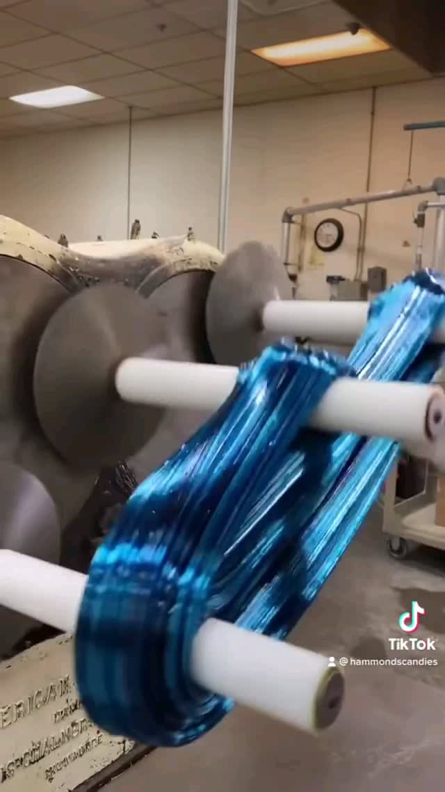 The way this candy changes colors as it is pulled