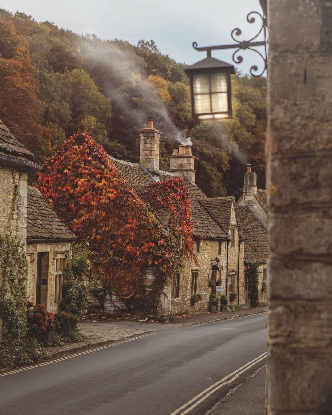 Ivy covered cottage in Castle Combe, a small village at Wiltshire, England.