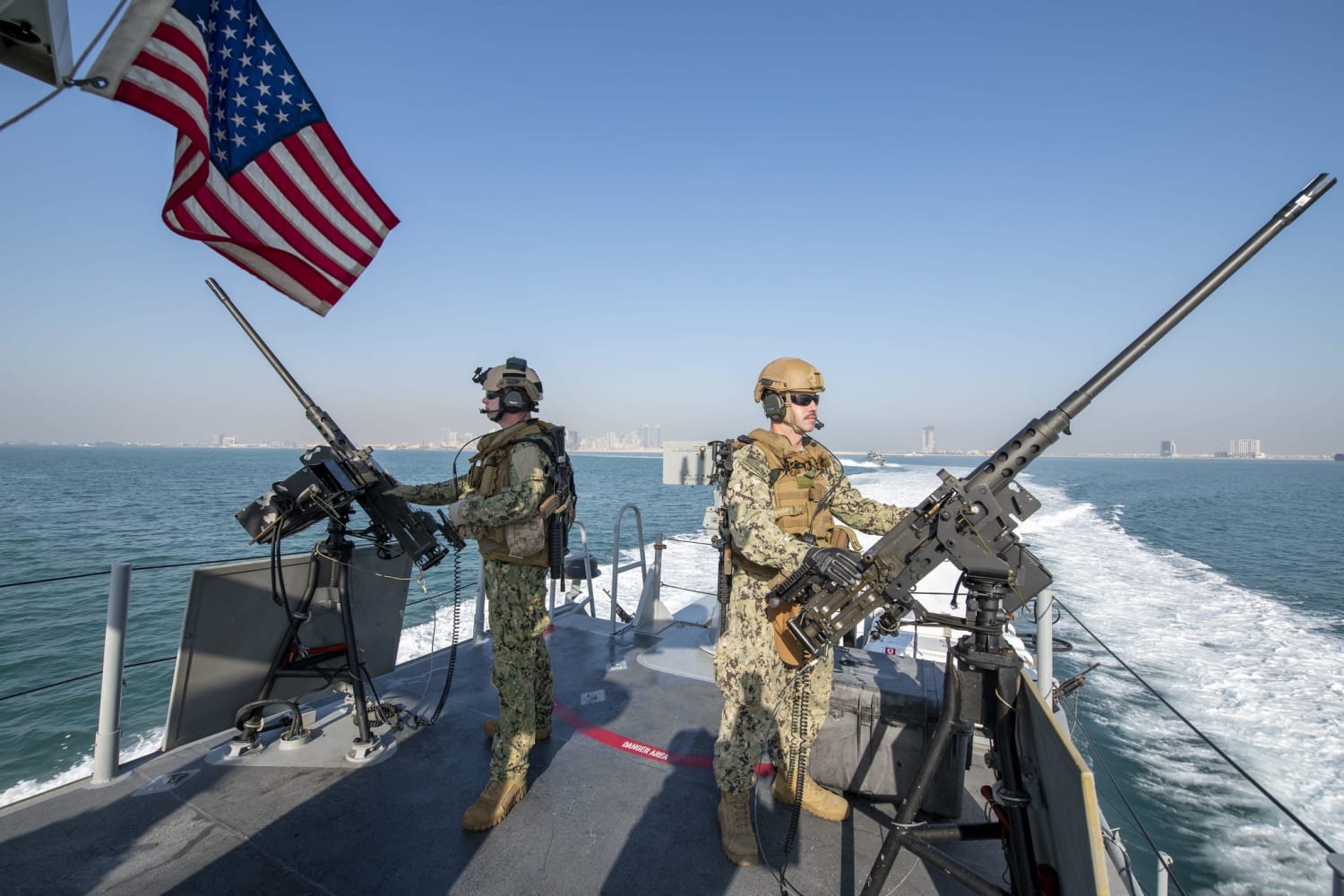 U.S. Navy warns mariners to stay clear of its warships in the Persian Gulf