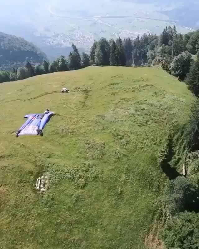 Gliding through the Swiss Alps in a wingsuit
