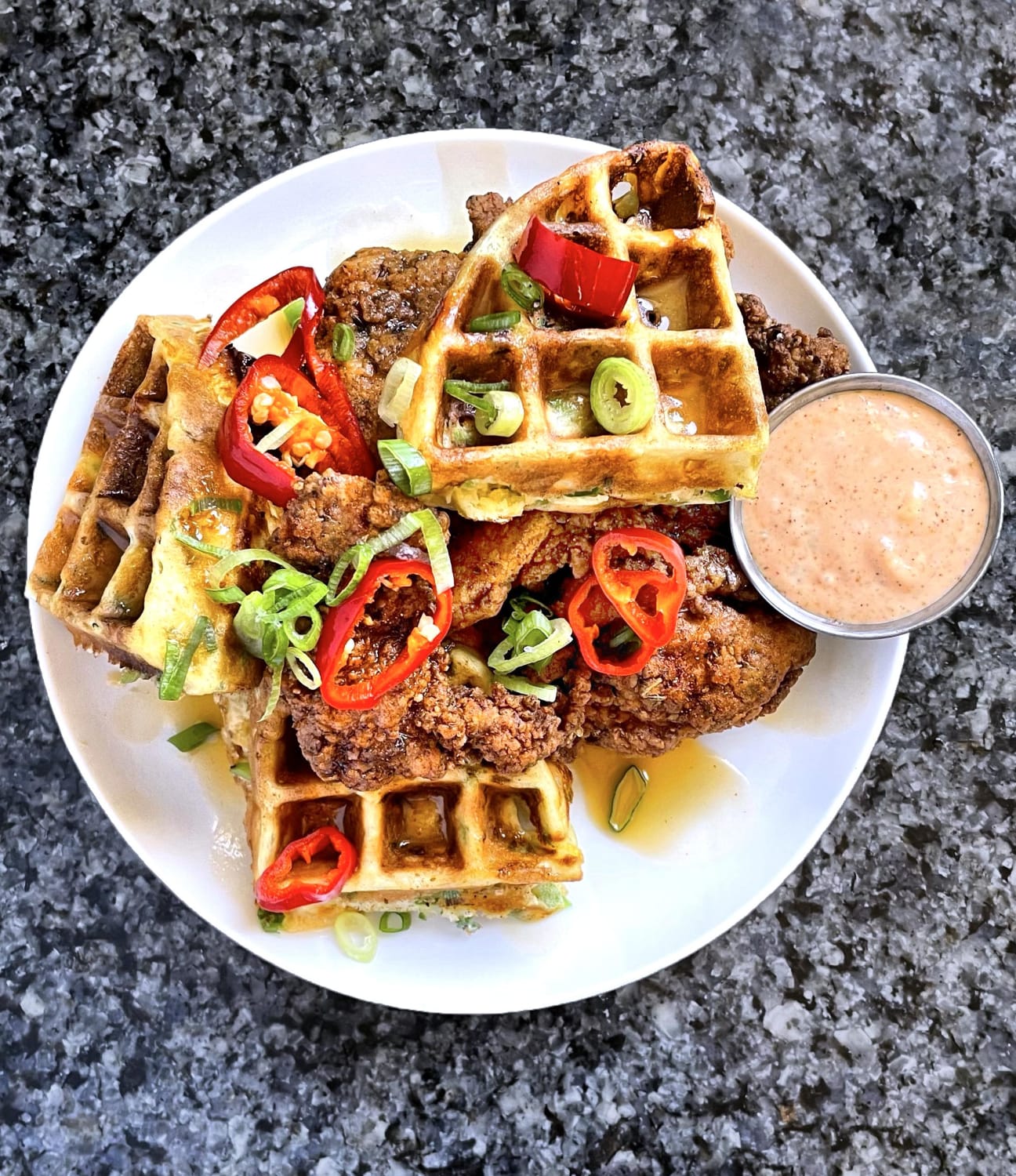 [Homemade] Fried chicken and jalapeno/cheddar/scallion waffles with spicy honey butter drizzle and pickled fresno chilis