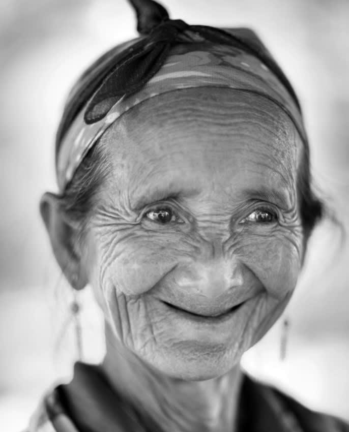 Smiling lady, Vang Vieng, Laos. (Image - David Noton).