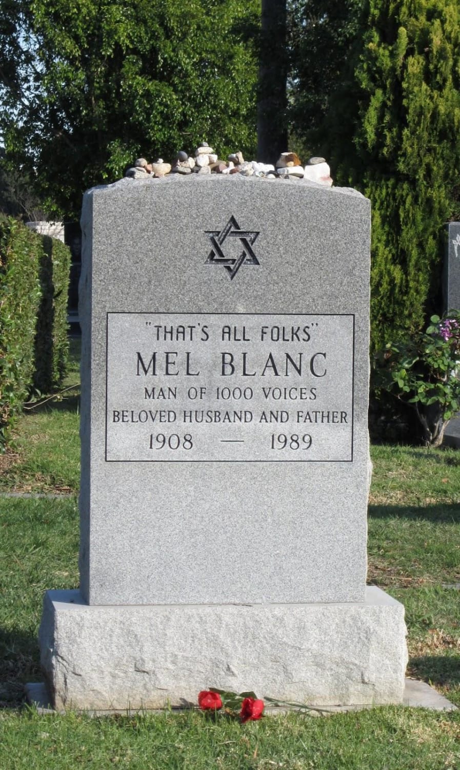 This is the gravestone of Mel Blanc. He voiced many cartoon characters, one of these was Porky Pig