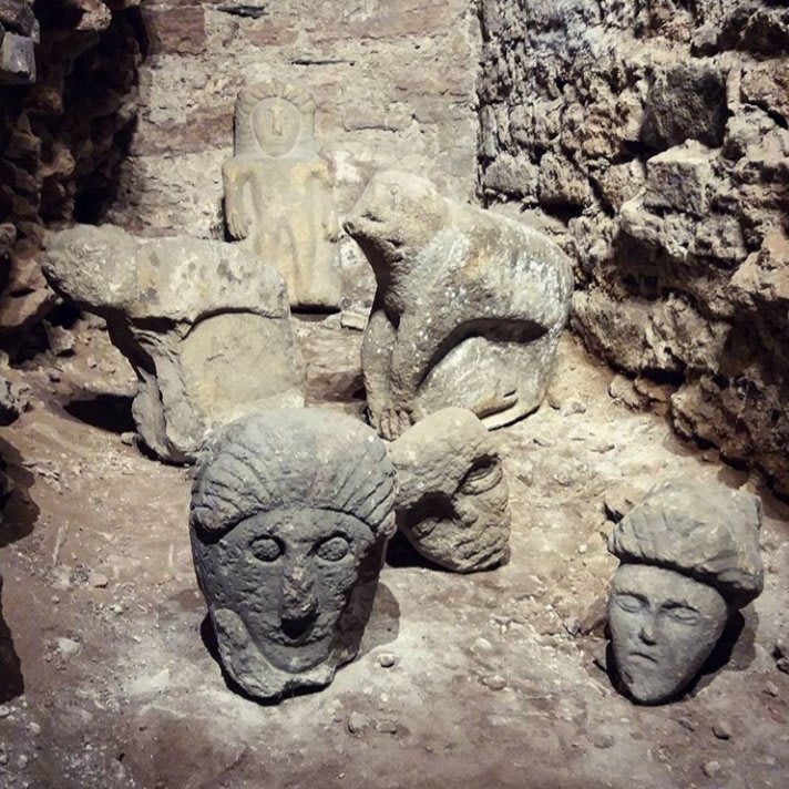 A series of crude stone carvings in the crypt of Armagh cathedral. Armagh was a sacred site from the earliest of times and some of these figures are thought to depict ancient Irish gods.