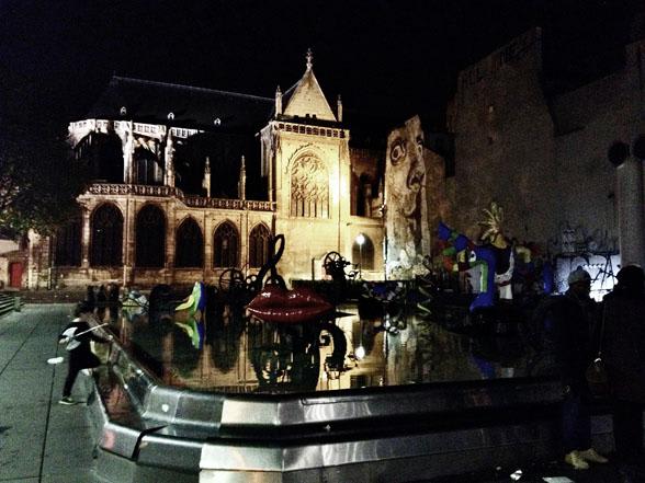 Stravinsky Fountain at night, Église St-Merri in the background (19 y/o Saint-Saëns took the organ post here in 1854).