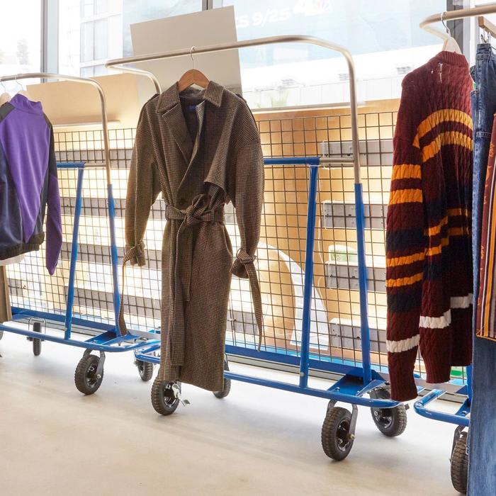 Warehouse equipment displays garments at Browns Fashion pop-up in LA